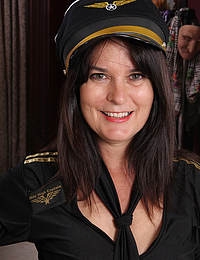 Captain Sherry Lee is ready to takeoff her clothes