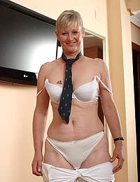 Horny 42 year old blond Nicole M strips after getting home from work