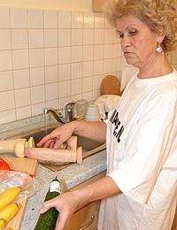 stuffing vegetables in her cunt